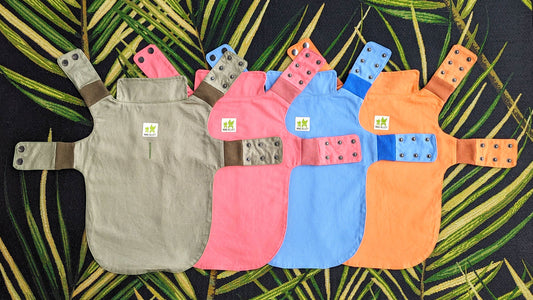 Colorful plastic-free dog rain jackets with adjustable snap closer for large dogs, small dogs, and adventure cats